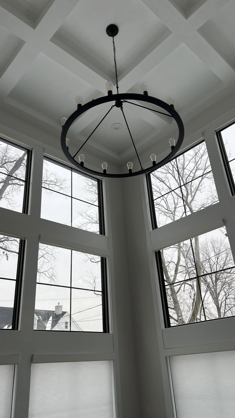 Coffered ceiling with statement chandelier