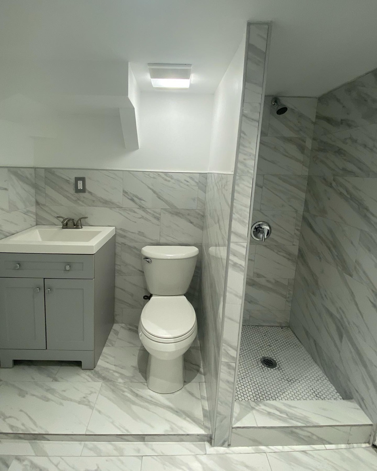Marble bathroom with walk-in shower